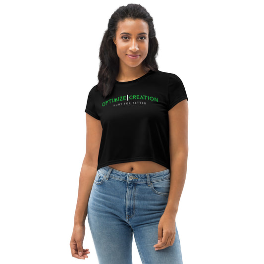 womens black athletic crop top with green and white text