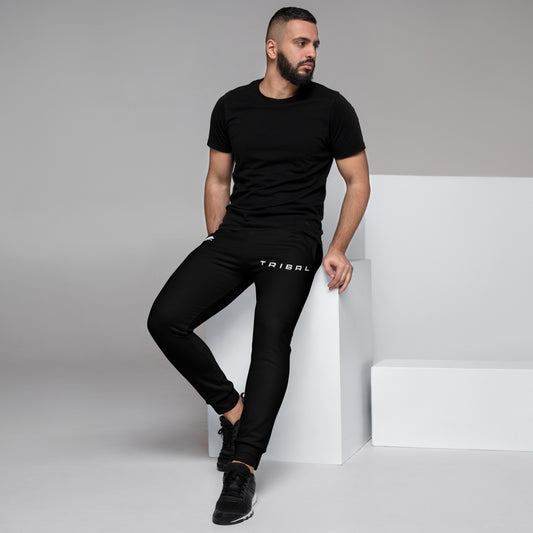 mens black joggers with white wolf logo on right thigh and tribal text on left thigh