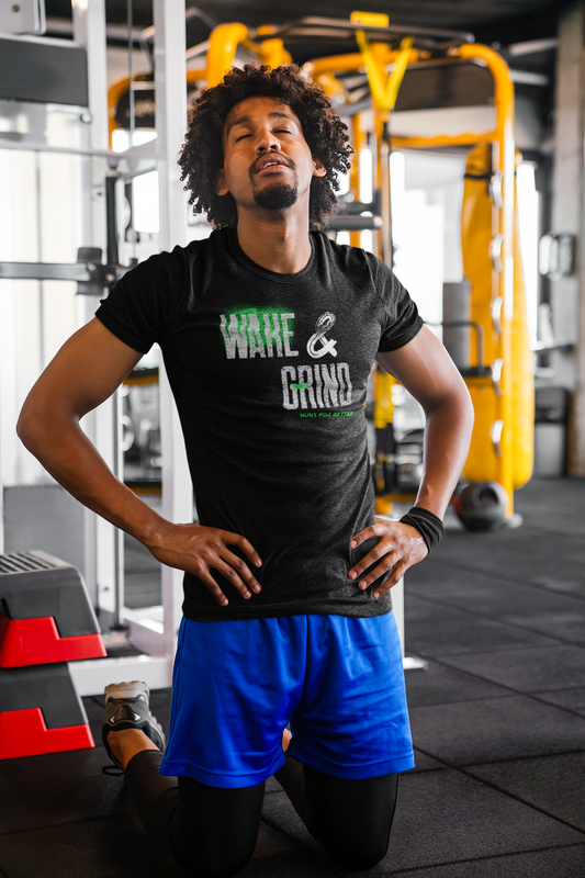 man kneeling in gym with black tribal lifestyle t-shirt