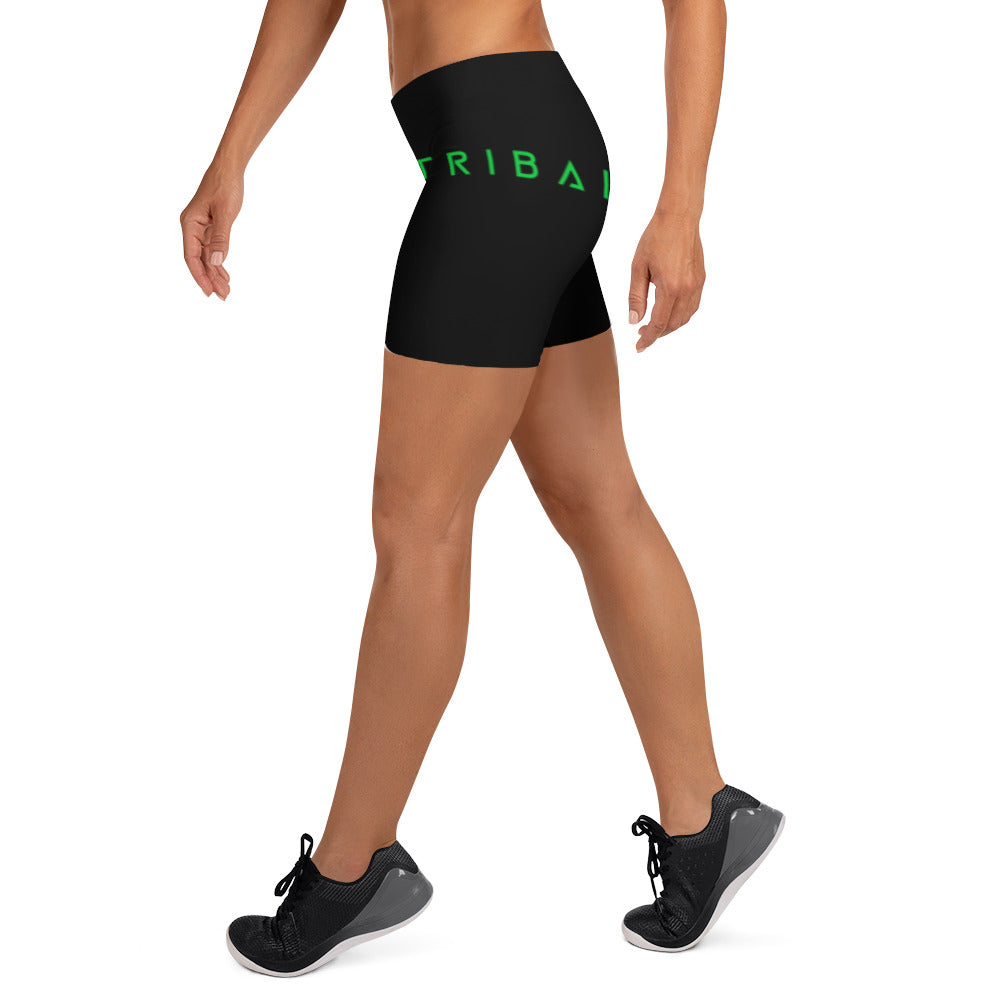 womens black performance shorts with tribal in green on left hip